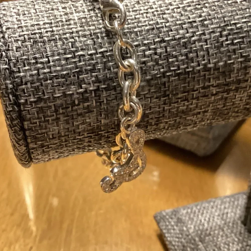 Silvertone Link Bracelet with Symbol Charm